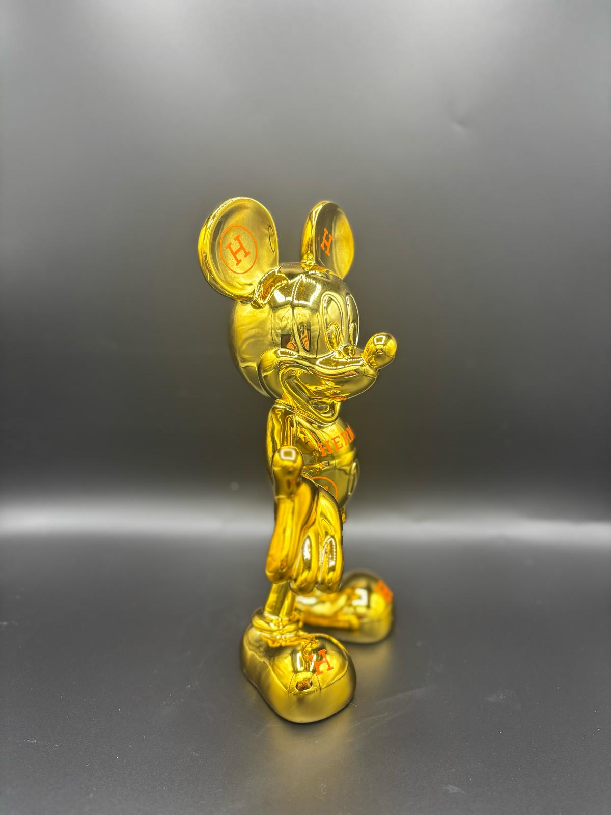 THE HERMES GOLD MICKEY