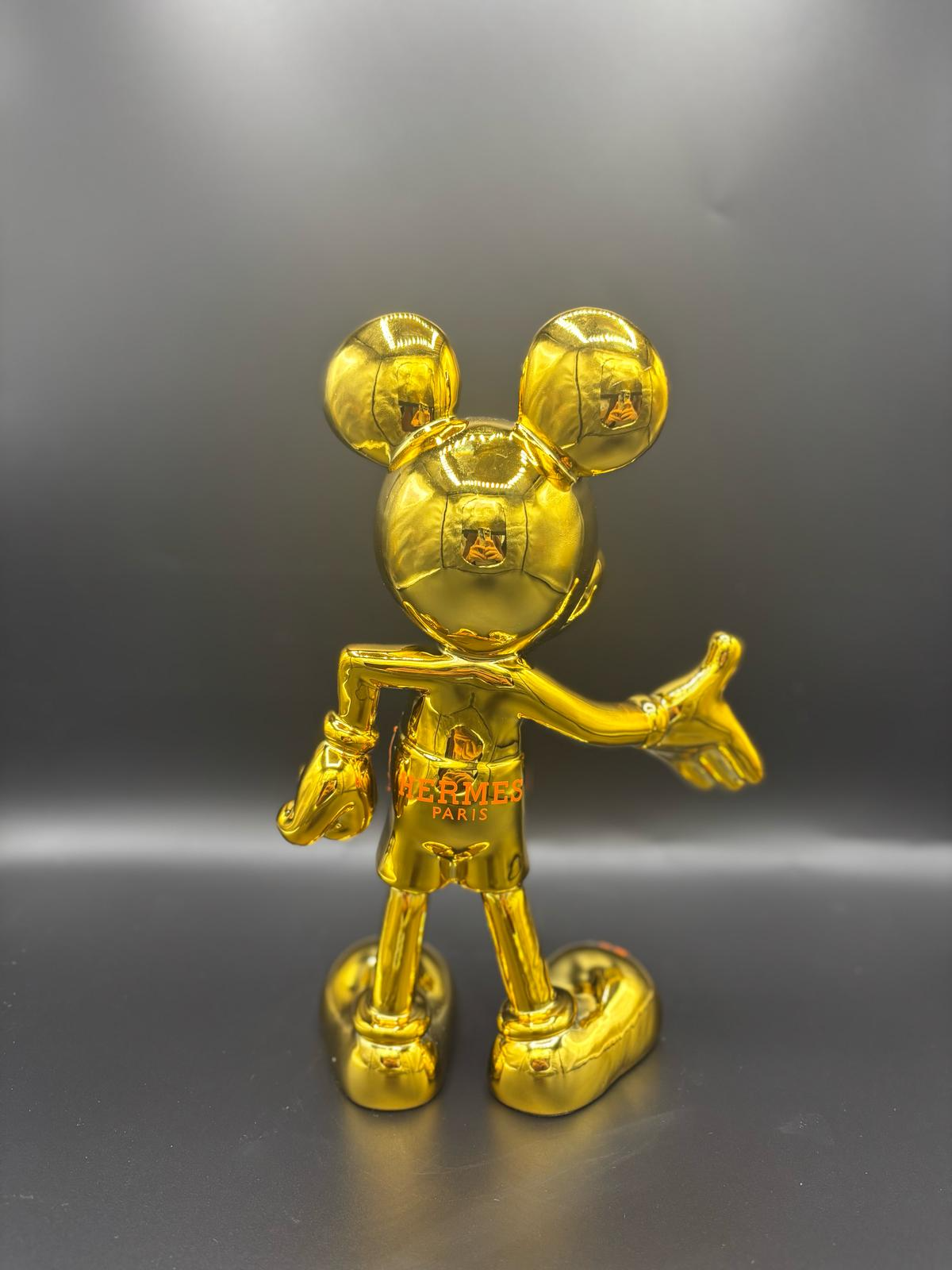 THE HERMES GOLD MICKEY