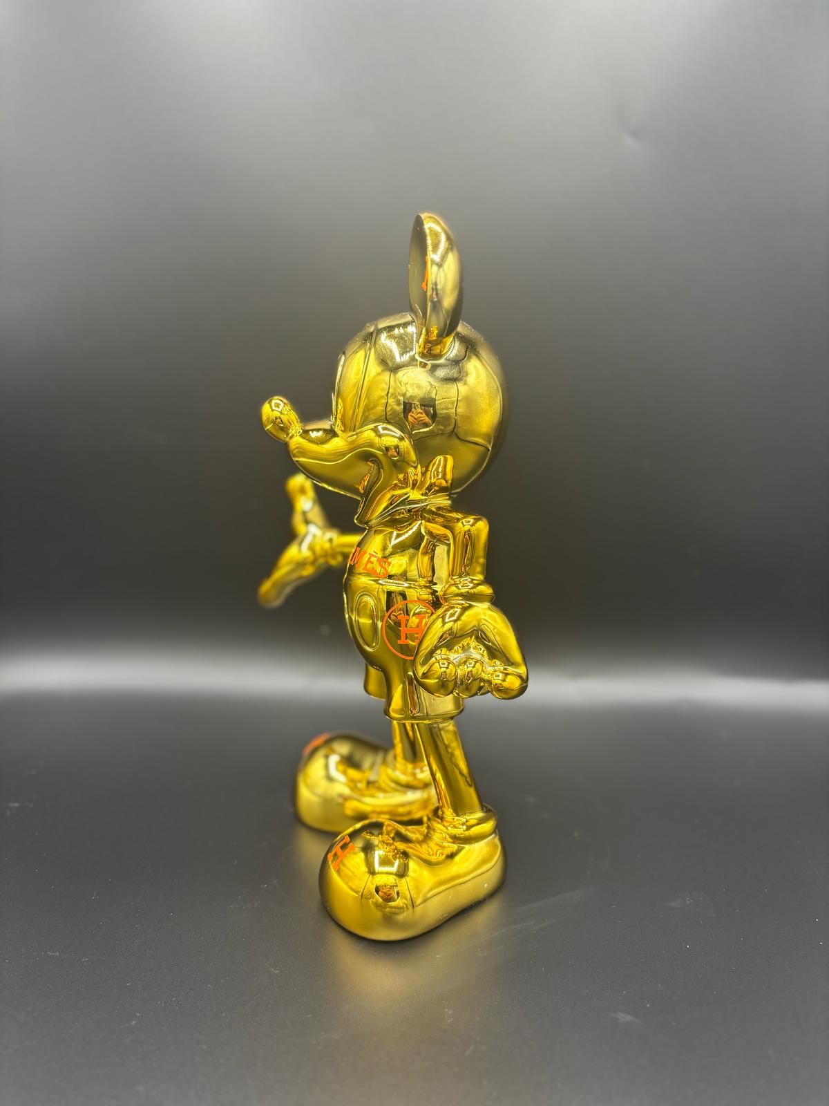 THE HERMES GOLD MICKEY