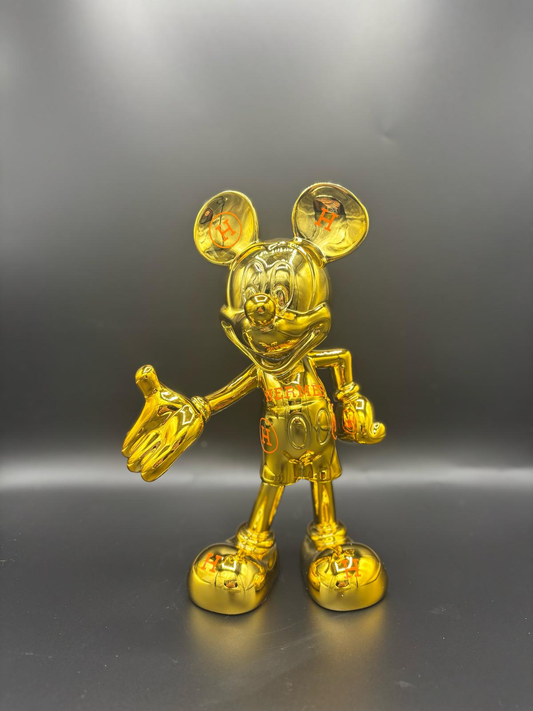 THE HERMES GOLD MICKEY