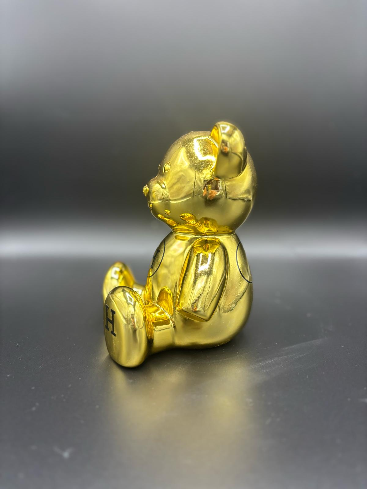 THE HERMES GOLD MINI BEAR